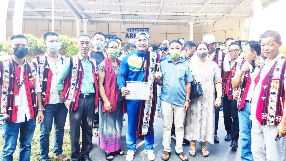 Moalong Yaden from Nagaland was placed 5th in World Bodybuilding and Physique Sports Championship at Tashkent recently. Competing with the best in the world at the 12th WBPF World Bodybuilding and Physique Sports Championship at Tashkent in Uzbekistan, Moalong Yaden secured the 5th place overall in the category of Sports Fitness Physique under 170 cm. Moalong, who performed on October 5 traveled back to Nagaland on October 12. He was accorded a warm welcome on arrival at the Dimapur Airport by the Merangkong Senso Union, Dimapur followed by a thanksgiving prayer at his residence in Dimapur. (Morung Photo) 